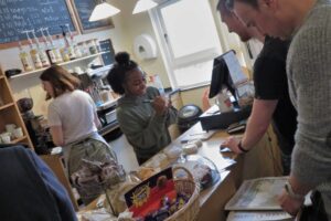 Students working in the Sugarloaf Café at Regents Theological College.